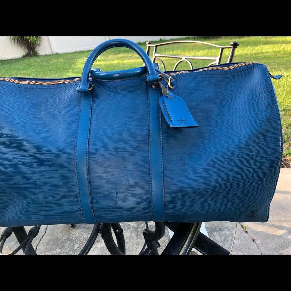 Authentic Louis Vuitton Blue Epi 60 Travel bag